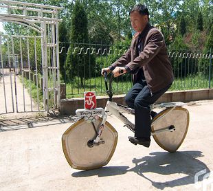 Bicycle with Reuleaux triangle and pentagonal wheels